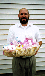 James Chinavera often approaches abortion-bound mothers with a basket of baby gifts.